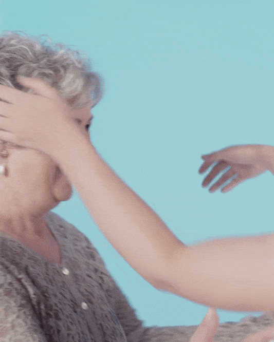 older women hugging a woman